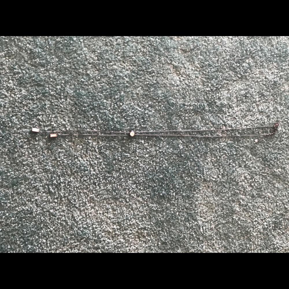 Dark silver lariat necklace w/clear stone accent